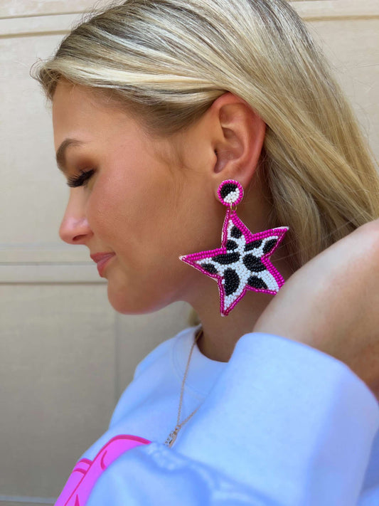 Pink star earrings